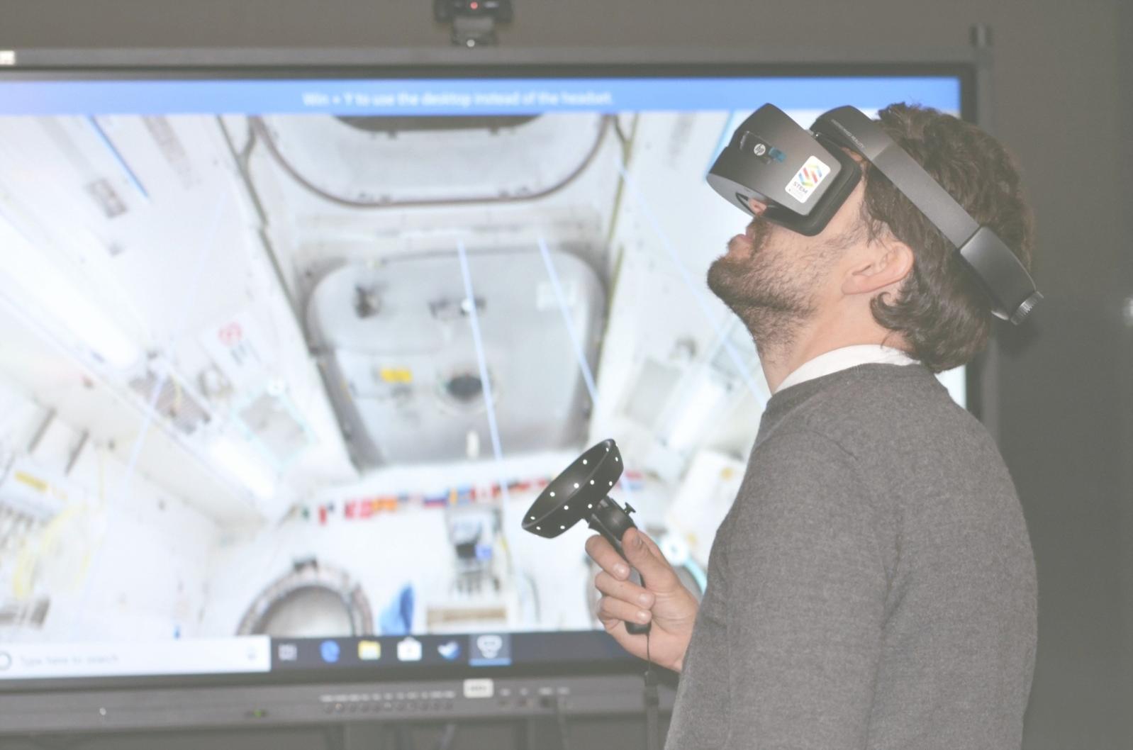AR/VR game development workshop participants working on cross-platform projects